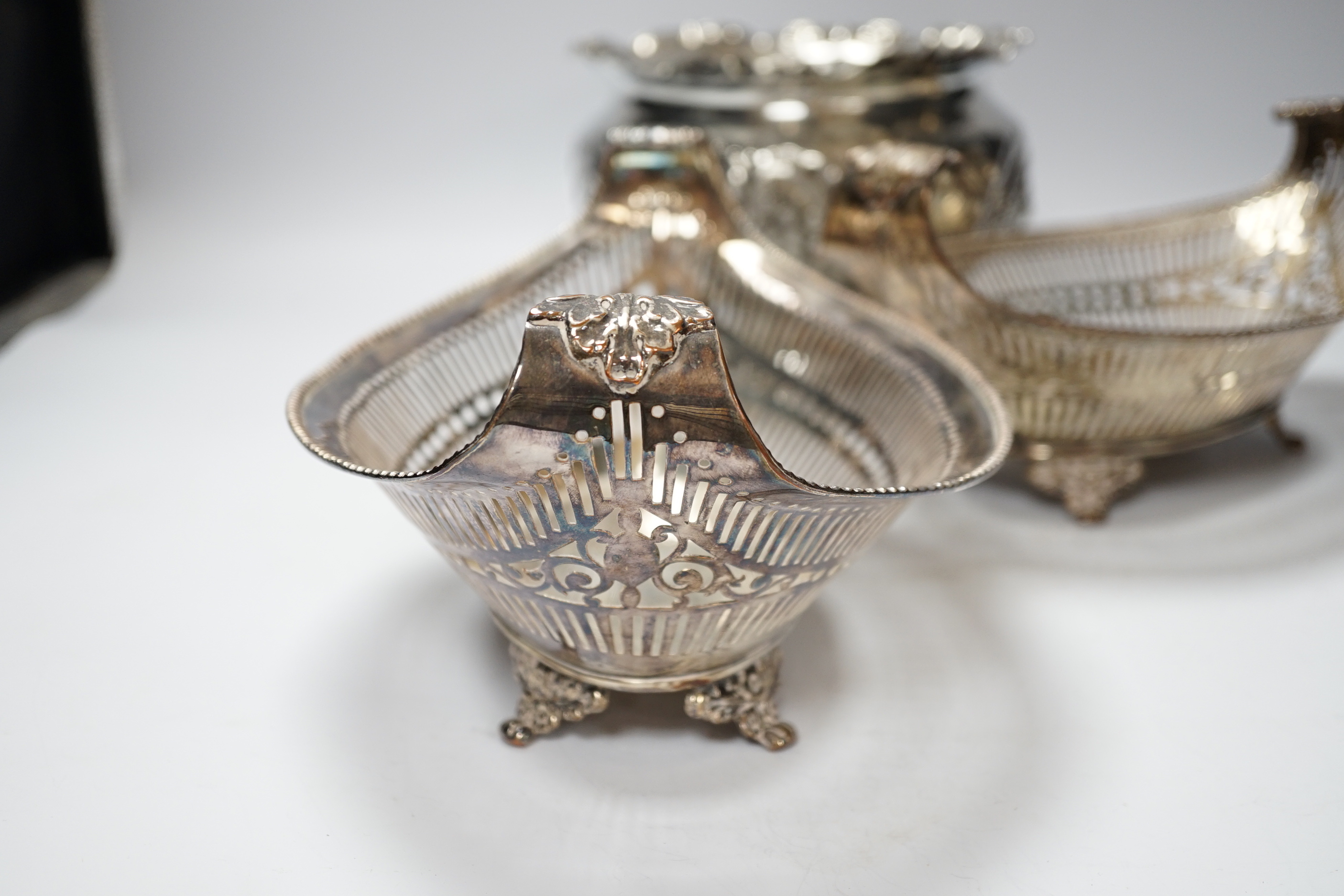 A pair of late 19th/early 20th century pierced plated oval dishes and plated jardiniere, dishes 25cm long